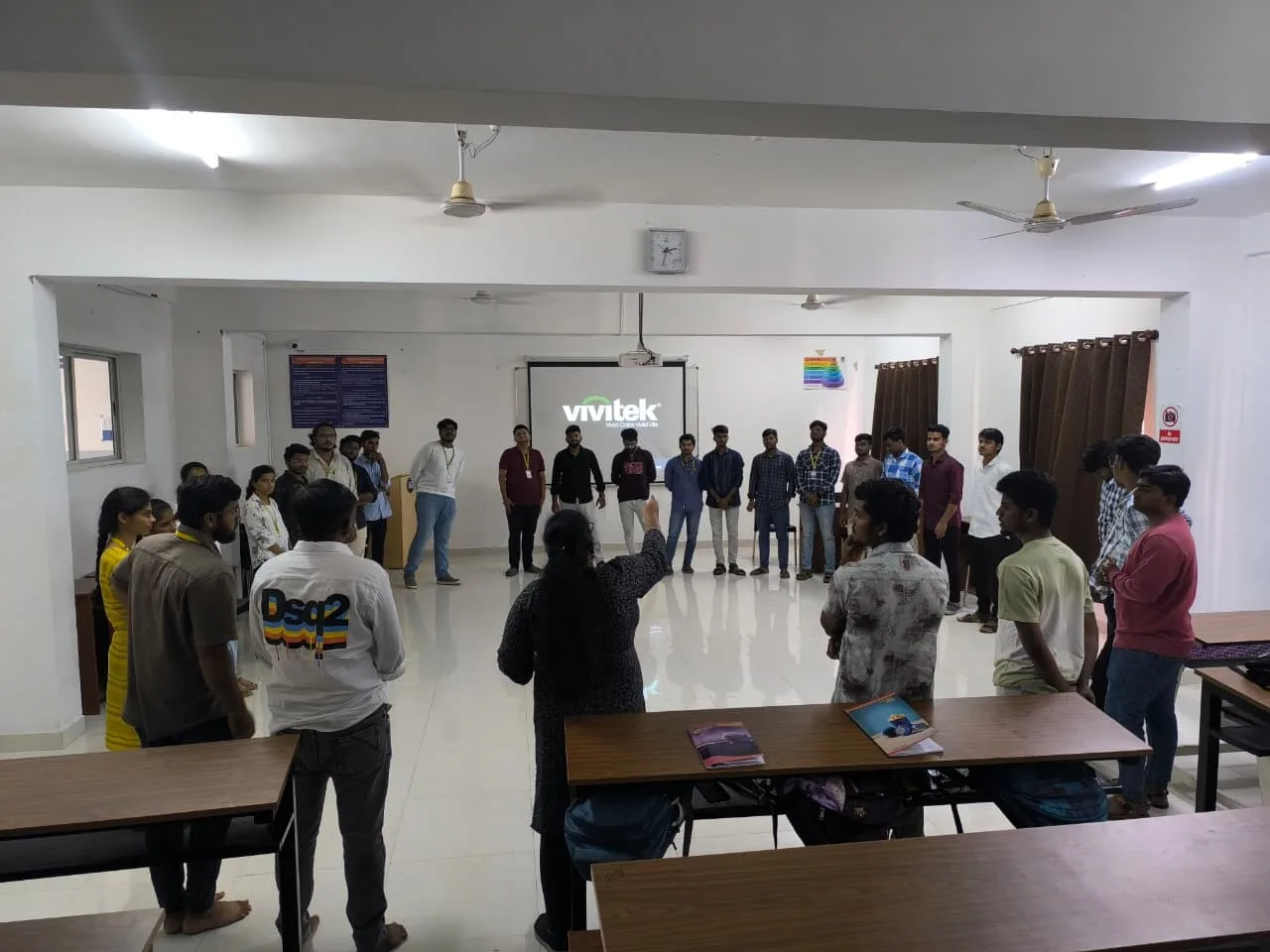 Students of Jain College of Engineering standing in a circle during a soft skills group activity